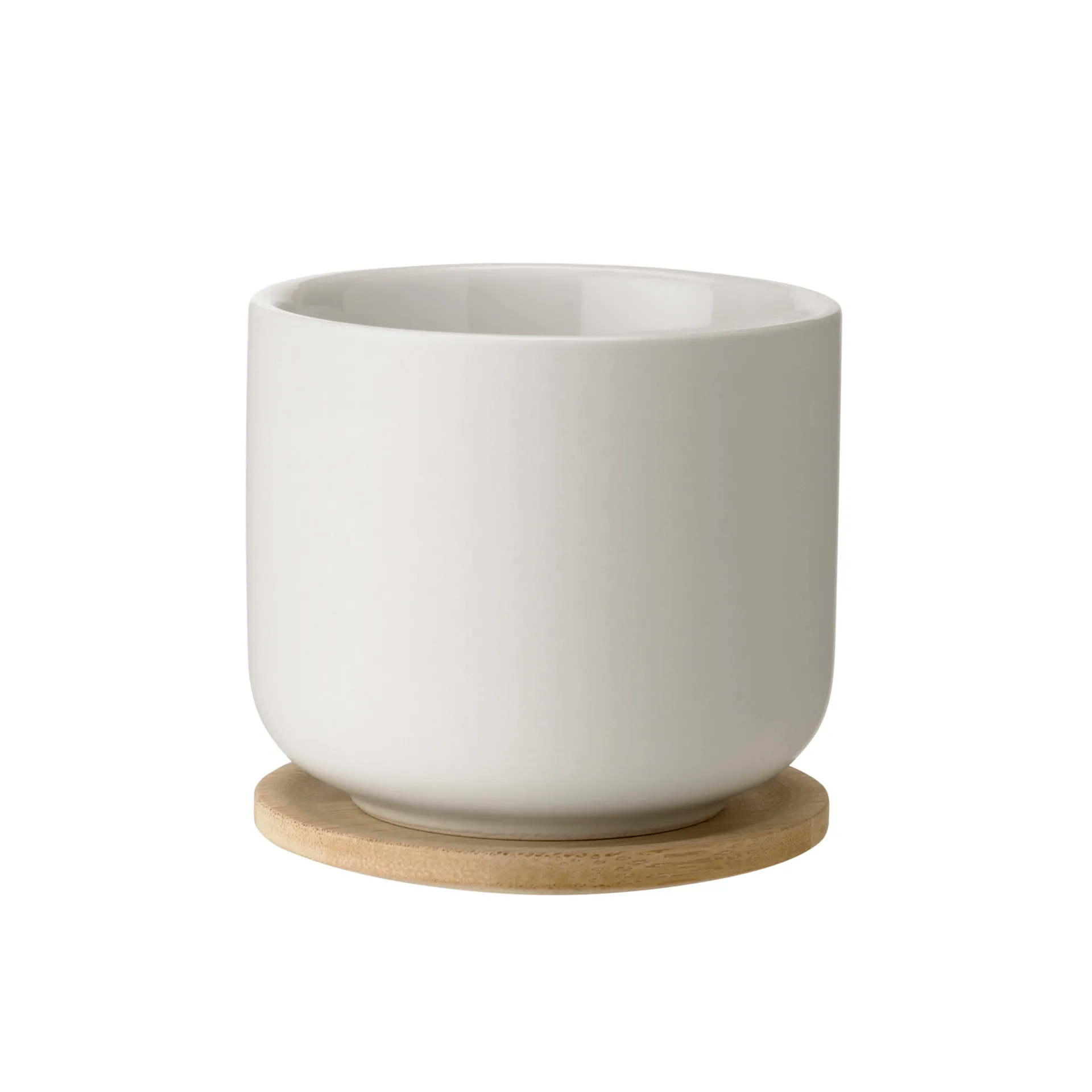 Theo Becher mit Untersetzer, Sand Stelton
