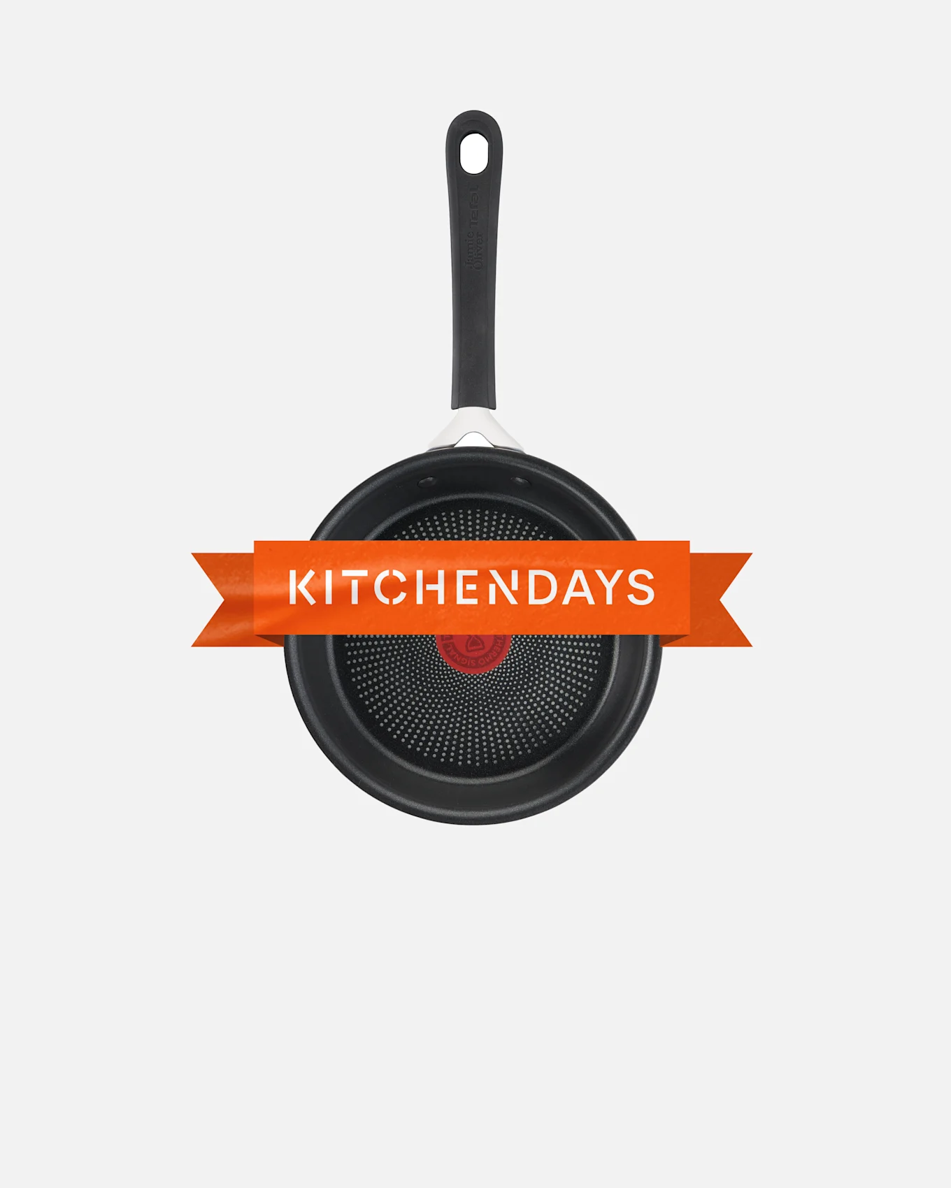 Schwarze Bratpfanne mit rotem ThermoSpoT und weißen Punkten auf der Oberfläche, überlagert von einem orangefarbenen 'KITCHENDAYS'-Banner.